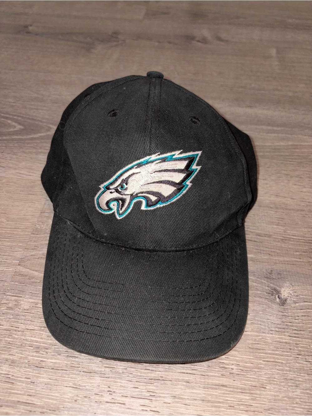 NFL Black Interior-Labeled Baseball Cap with Orange Logo Accent
